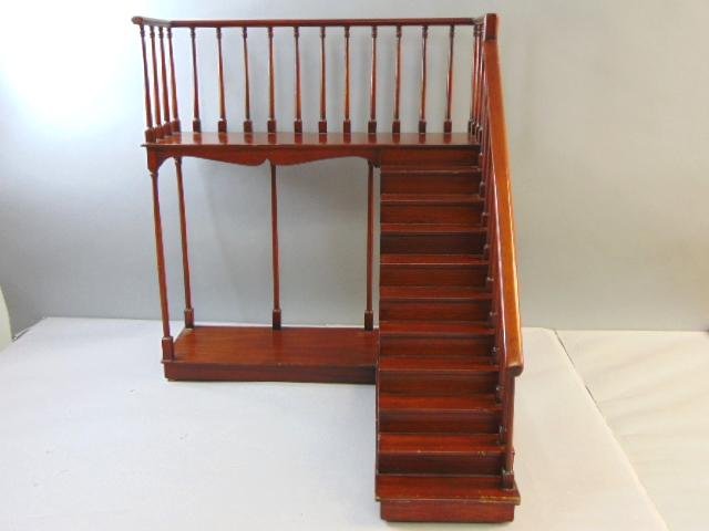 Vintage Wooden Dollhouse Staircase And Railing: THIS WOODEN DOLLHOUSE STAIRCASE AND RAILING MEASURES 24 1/2" BY 21 7/8" BY 22 1/4". STAIRCASE HAS A BROKEN FISRT STEP, AND MINOR CHIPS AS SEEN IN THE PICTURES, WOULD BE BUYING AS IS. WOULD MAKE A GREA