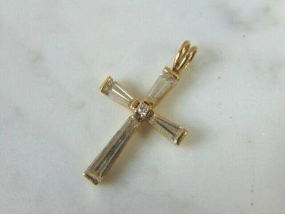 Vintage 14K Yellow Gold Religious Cross Pendant: FOR SALE IS THIS VINTAGE ESTATE 14K YELLOW GOLD RELIGIOUS CROSS PENDANT WITH CRYSTAL CHIPS. THE PENDANT WEIGHS 2.3g AND MEASURES 1 1/8" LONG BY 5/8" WIDE. MAKES A GREAT GIFT FOR THAT SOMEONE