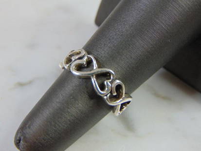 Womens Vintage Estate Sterling Silver Heart Ring: FOR SALE IS THIS LOVELY VINTAGE STERLING SILVER HEART RING. THE TOTAL WEIGHT IS 2.5g, AND IS A SIZE 5. THIS RING WOULD MAKE A GREAT GIFT FOR SOMEONE SPECIAL. ANY QUESTIONS PLEASE DONT HESITATE TO