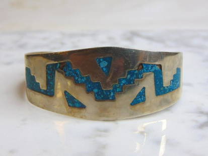 Vintage Sterling Silver Southwestern Design Bracelet: FOR SALE IS THIS BEAUTIFUL VINTAGE ESTATE .925 STERLING SILVER BRACELET WITH TURQUOISE INLAY. THE BRACELET WEIGHS 19.8g AND MEASURES 5 1/4" LONG BY 1" WIDE. THE CONDITION IS GOOD BUT AS YOU CAN