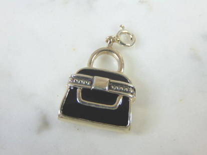 Womens Vintage Estate Sterling Silver Purse Charm: FOR SALE IS A VINTAGE ESTATE WOMEN'S STERLING SILVER PURSE CHARM . CHARM MEASURES 1 1/8" LONG BY 5/8" WIDE AND WEIGHS 7.9g. MAKES A GREAT GIFT FOR THAT SOMEONE SPECIAL. IF ANY QUESTIONS, PLEASE