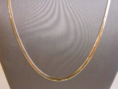 Womens Vintage 14K Yellow Gold Herringbone Necklace: FOR SALE IS THIS LOVELY WOMENS VINTAGE ESTATE 14K GOLD HERRINGBONE NECKLACE . THE NECKLACE WEIGHS 12.8g, AND MEASURES 30" LONG BY 1/8" WIDE. MAKES A GREAT GIFT FOR THAT SOMEONE SPECIAL. IF ANY