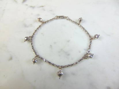 Womens Vintage Estate 18K White Gold Bracelet: A LOVELY VINTAGE ESTATE 18K WHITE GOLD BRACELET. THE BRACELET WEIGHS 7.2g AND MEASURES 7 1/2" LONG. WOULD MAKE A GREAT GIFT FOR THAT SOMEONE SPECIAL. ANY QUESTIONS PLEASE DONT HESITATE TO ASK. BE