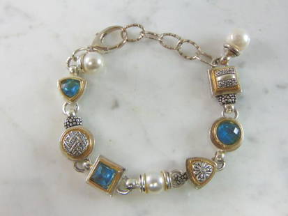 Womens Vintage Sterling Silver Aquamarine Bracelet: FOR SALE IS A LOVELY VINTAGE ESTATE .925 STERLING SILVER AQUAMARINE BRACELET. NOT SURE IF STONES ARE NATURAL OR MAN MADE. BRACELET MEASURES 9" LONG BY 1/2" WIDE AND WEIGHS 51.1g. THIS WOULD MAKE A