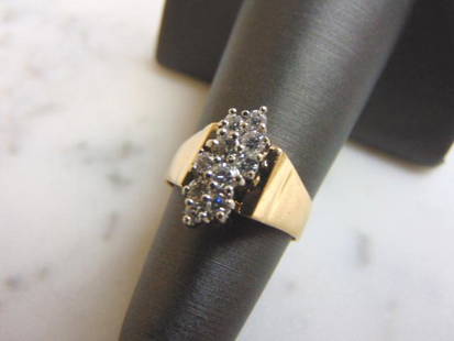 Womens Vintage 14k Gold Exquisite Diamond Cluster Ring: FOR SALE IS THIS WONDERFUL 14K GOLD & DIAMOND CLUSTER RING, MADE BY EXQUISITE. THE RING WEIGHS 4.2g. THE SIZE OF THE RING IS A 4.75. THERE ARE ABOUT .70cts OF DIAMONDS AND THE FACE IS ABOUT 1/2"