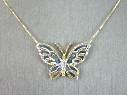 Womens Vintage Estate 14K Yellow Gold Butterfly Pendant Necklace: A WOMENS VINTAGE ESTATE 14K YELLOW, WHITE AND ROSE GOLD BUTTERFLY PENDANT WITH NECKLACE. THE NECKLACE AND PENDANT WEIGHS 1.8g. THE NECKLACE MEASURES 18" LONG. THE PENDANT MEASURES 3/4" LONG BY 1"