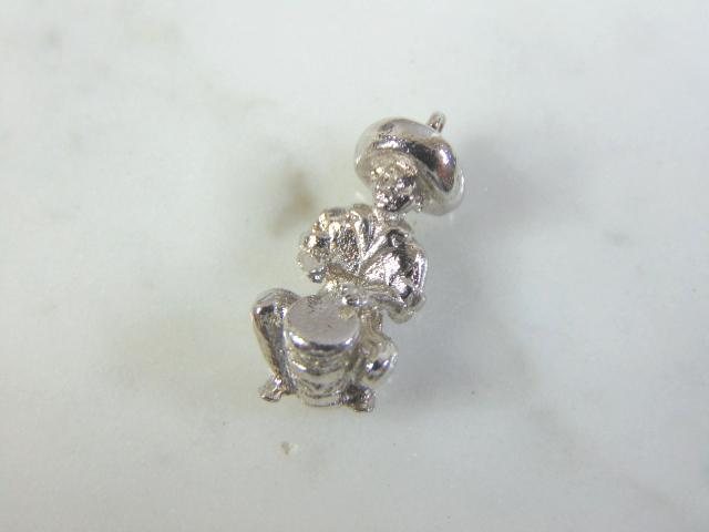 Womens Vintage Estate Sterling Silver Drummer Charm: FOR SALE IS A UNIQUE VINTAGE ESTATE WOMEN'S STERLING SILVER DRUMMER CHARM . CHARM MEASURES 7/8" LONG BY 3/8" WIDE AND WEIGHS 3.4g. MAKES A GREAT GIFT FOR THAT SOMEONE SPECIAL. IF ANY QUESTIONS, PLEASE