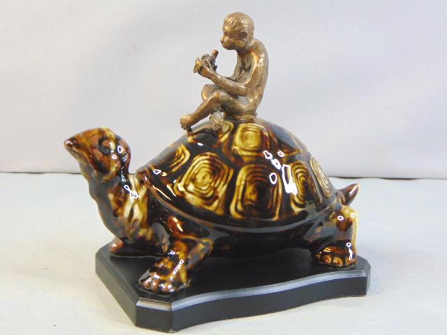 Monkey On Tortoise Porcelain Sculpture: FOR SALE IS THIS AMAZINGLY DECORATIVE AND HIGH QUALITY MONKEY ON TORTOISE PORCELAIN SCULPTURE. THE SCULPTURE STANDS 7 7/8" TALL BY 9" LONG BY 5 1/4" WIDE. GREAT PIECE TO ADD TO A ROOM OR OFFICE. IF TH