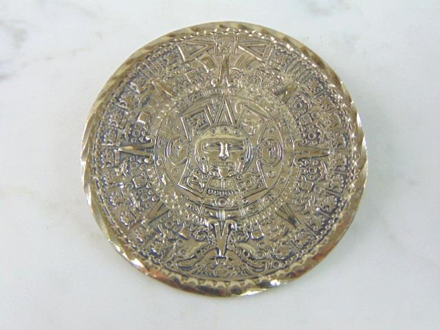 Womens Vintage Estate Sterling Silver Mayan Brooch: FOR SALE IS A LOVELY FINE .925 STERLING SILVER MAYAN BROOCH. THE BROOCH MEASURES 2 1/4" IN DIAMETER , AND WEIGHS 16g. ANY OTHER QUESTIONS, PLEASE DON'T HESITATE TO ASK. MAKES AN ATTRACTIVE GIFT FOR TH