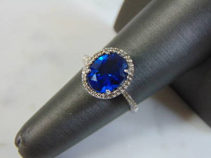 Womens Vintage 14K White Gold Sapphire & Diamond Ring: FOR SALE IS A LOVELY VINTAGE ESTATE 14K WHITE GOLD, SAPPHIRE AND DIAMOND RING. THE RING WEIGHS 4.1g, AND IS A SIZE 6.25. THERE ARE ABOUT .48cts OF DIAMONDS. THE SAPPHIRE IS ABOUT 2.5cts AND IS