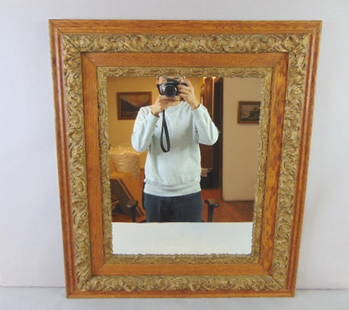 Decorative Antique Victorian Eastlake Oak Wall Mirror: A BEAUTIFUL ANTIQUE OAK WALL MIRROR THAT IS ACCENTED WITH GOLD LEAF. PIECE MEASURES ABOUT 29 3/4" BY 26". CONDITION IS VERY NICE. MAKES A BEAUTIFUL ACCENT PIECE. ANY QUESTIONS PLEASE DO NOT HESITATE T