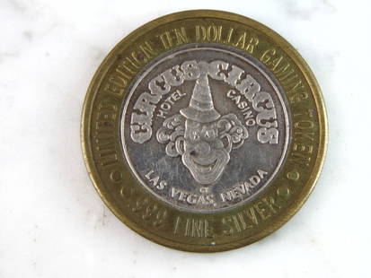 $10 Circus Circus Casino .999 Silver Casino Token: FOR SALE IS THIS $10 CIRCUS CIRCUS CASINO .999 SILVER CASINO TOKEN. TOKEN APPEARS TO BE IN GOOD CONDITION, HOWEVER WE ARE NOT COIN EXPERTS WHEN IT COMES TO PROPER GRADING. FINENESS IS .999. TOKEN WEIG