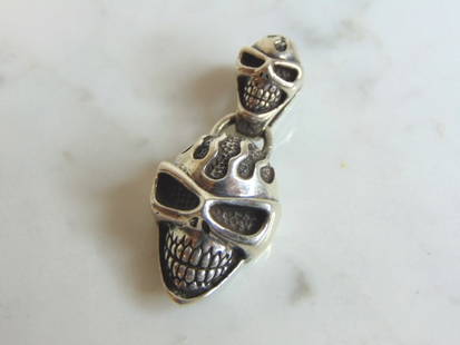 Vintage Estate Sterling Silver Gothic Skull Pendant: FOR SALE IS THIS LOVELY VINTAGE .925 STERLING SILVER GOTHIC TWO HEADED SKULL PENDANT. THE TOTAL WEIGHT OF THE PENDANT IS 14.8g. THE PENDANT MEASURES 1 1/2" LONG BY 5/8" WIDE. MAKES A GREAT GIFT FOR TH