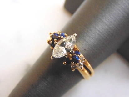 Womens Vintage 14K Gold Marquise Diamond Sapphire Ring: FOR SALE IS THIS LOVELY WOMENS VINTAGE 14K YELLOW GOLD MARQUISE DIAMOND ENGAGEMENT RING, ACCENTED WITH SAPPHIRES. THE TOTAL WEIGHT IS 5.1g, AND IS A SIZE 6.25. RING HAS ABOUT 1.18cts OF DIAMONDS IN IT