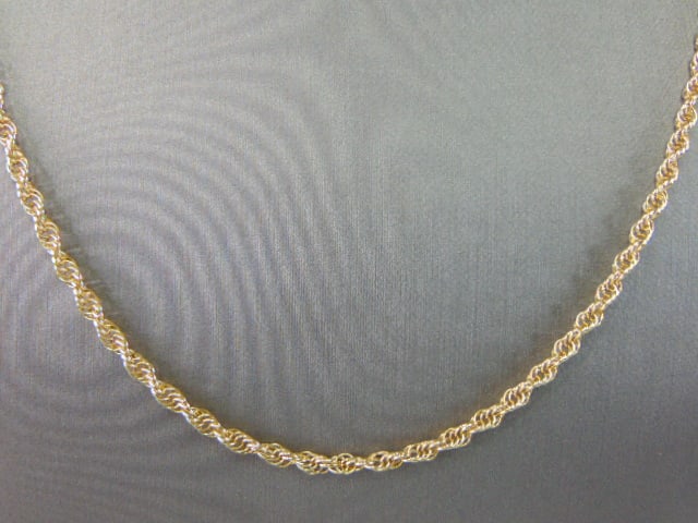 Womens Vintage Estate 14K Yellow Gold Rope Necklace: FOR SALE IS THIS LOVELY VINTAGE 14K GOLD NECKLACE. THE TOTAL WEIGHT 14.2g, AND MEASURES ABOUT 28" LONG BY 1/8" WIDE. MAKES A GREAT GIFT FOR THAT SPECIAL SOMEONE. ANY QUESTIONS PLEASE DO NOT HESITATE T