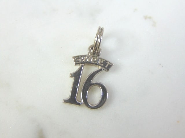 Womens Vintage Estate Sterling Silver Sweet 16 Charm: FOR SALE IS THIS WOMENS VINTAGE ESTATE STERLING SILVER SWEET 16 CHARM. CHARM WEIGHS 1g AND CHARM MEASURES 7/8" LONG BY 3/8" WIDE. MAKES A GREAT GIFT FOR THAT SOMEONE SPECIAL. IF ANY QUESTIONS, PLEASE 