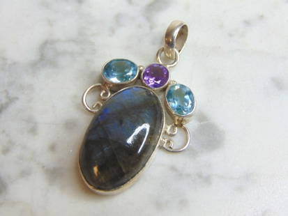 Womens Sterling Silver Labradorite Stone Pendant: FOR SALE IS THIS WOMENS VINTAGE ESTATE .925 STERLING SILVER LABRADORITE STONE PENDANT. NOT SURE IF STONES ARE REAL OR MAN MADE. THE PENDANT WEIGHS 10.6g AND MEASURES 1 7/8" LONG BY 1 1/8" WIDE. MAKES