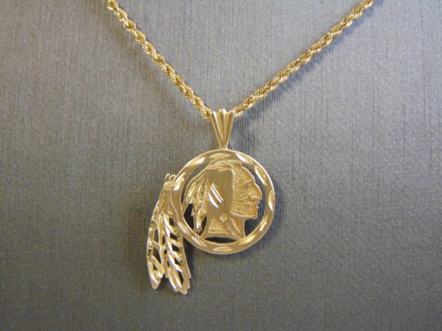 14K Gold Necklace w/ Redskins Football Pendant: FOR SALE IS THIS LOVELY VINTAGE 14K YELLOW GOLD WASHINGTON REDSKINS FOOTBALL PENDANT WITH GOLD ROPE NECKLACE. THE TOTAL WEIGHT IS 6.7g. THE PENDANT MEASURES 1" LONG BY 5/8" WIDE. THE NECKLACE ITSELF M