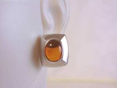 Womens Vintage Sterling Silver w/ Amber Stone Earrings: A PAIR OF WOMENS VINTAGE ESTATE STERLING SILVER WITH WHAT APPEARS TO BE AN AMBER STONE, NOT SURE IF REAL OR MAN MADE. EARRINGS WEIGH 8.3g AND MEASURES 5/8" LONG BY 1/2" WIDE. ANY OTHER QUESTIONS, PLEA