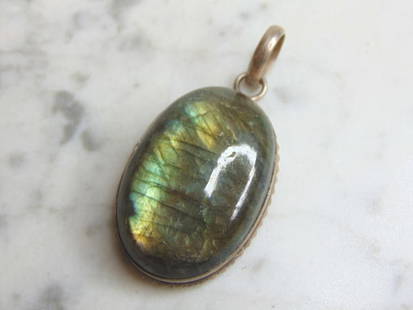 Womens Sterling Silver Labradorite Stone Pendant: FOR SALE IS THIS WOMENS VINTAGE ESTATE .925 STERLING SILVER LABRADORITE STONE PENDANT. NOT SURE IF STONES ARE REAL OR MAN MADE. PENDANT WEIGHS 18.2g AND PENDANT MEASURES 2 1/8" LONG BY 1" WIDE. MAKES