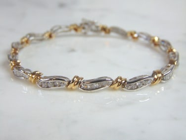 WOMENS VINTAGE 14K GOLD TENNIS BRACELET W/ DIAMONDS