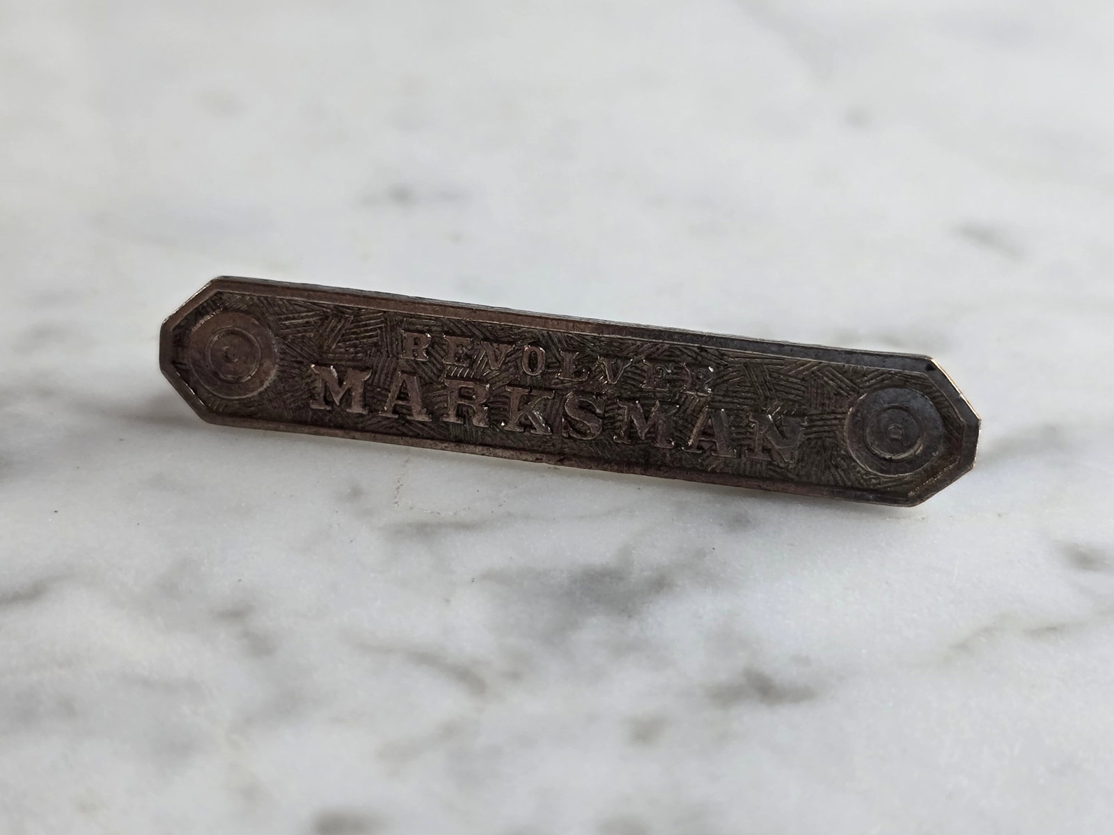 Vintage Estate Sterling Silver Military Revolver Marksman Pin: A VINTAGE ESTATE STERLING SILVER REVOLVER MARKSMAN PIN. THE PIN MEASURES 1 3/4" LONG BY 1/4" WIDE, AND WEIGHS 4.3g. ANY QUESTIONS, PLEASE DON'T HESITATE TO ASK. MAKES AN ATTRACTIVE GIFT FOR THAT SOMEO