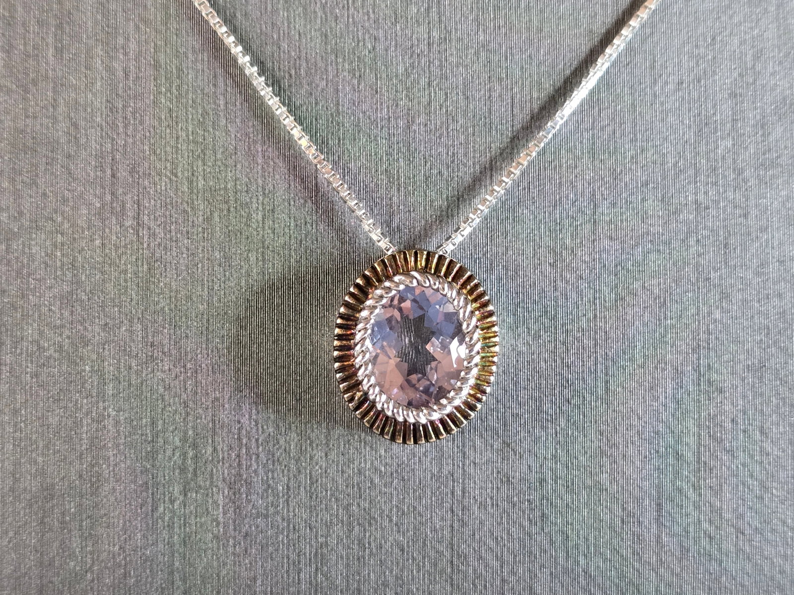 Womens Vintage Estate Sterling Silver CZ Stone Pendant Necklace: A VERY NICE WOMENS STERLING SILVER NECKLACE WITH A CZ PENDANT. NECKLACE WITH PENDANT WEIGHS 4.7g. PENDANT MEASURES 3/4" BY 1/2". THE NECKLACE MEASURES 18" LONG. WOULD MAKE A GREAT GIFT FOR SOMEONE SPE
