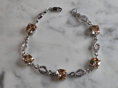 Womens Vintage Estate Sterling Silver Morganite Colored Bracelet: A WOMENS VINTAGE ESTATE STERLING SILVER MORGANITE COLORED BRACELET. NOT SURE IF STONES ARE NATURAL OR MAN MADE. BRACELET MEASURES 7 1/2" LONG BY 5/16" WIDE, AND WEIGHS 12.4g. THIS WOULD MAKE A LOVELY