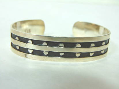 Vintage Sterling Silver Cuff Bracelet: FOR SALE IS A LOVELY VINTAGE ESTATE STERLING SILVER CUFF BRACELET. THE BRACELET WEIGHS 26.7g AND MEASURES ABOUT 1/2" WIDE. THE INSIDE OPENING MEASURES 2 1/2" BY 2". ANY QUESTIONS PLEASE DO NOT HESITAT