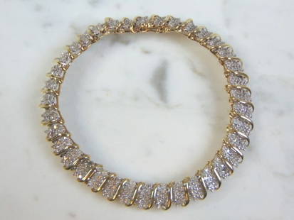 Womens Vintage Estate 14K Yellow Gold Diamond Bracelet: A LOVELY VINTAGE ESTATE 14K YELLOW GOLD BRACELET WITH DIAMONDS. THE BRACELET WEIGHS 14.2g. THE BRACELET MEASURES 8" LONG BY 3/8" WIDE. THERE ARE ABOUT 3.7cts OF DIAMONDS IN THE BRACELET. WOULD MAKE A