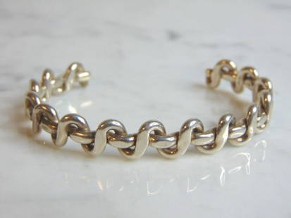 Womens Vintage Estate Sterling Silver Cuff Bracelet: FOR SALE IS THIS WONDERFUL VINTAGE ESTATE STERLING CUFF BRACELET. THE BRACELET WEIGHS 27.7g AND IS ABOUT 3/8" WIDE. ANY QUESTIONS PLEASE DO NOT HESITATE TO ASK. BE SURE TO CHECK OUT SOME OF OUR OTHER
