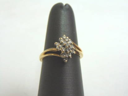 Women's Vintage 14K Yellow Gold Diamond Cluster Ring: FOR SALE IS THIS ATTRACTIVE 14K YELLOW GOLD DIAMOND CLUSTER RING. THE RING WEIGHS 3.0g, AND IS A SIZE 5.25. THERE ARE ABOUT .45 cts OF DIAMONDS. ANY QUESTIONS, PLEASE DO NOT HESITATE TO ASK. THIS MAKE