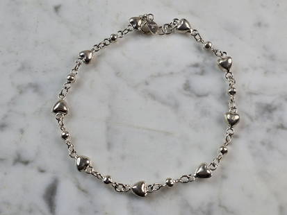 Womens Vintage Estate Sterling Silver Heart Anklet Bracelet: A WOMENS VINTAGE ESTATE STERLING SILVER HEART ANKLET BRACELET THAT MEASURES 10" LONG BY, 1/4" WIDE, AND WEIGHS 7.3g. THIS WOULD MAKE A LOVELY GIFT FOR THAT SOMEONE SPECIAL. ANY QUESTIONS, PLEASE DON'T