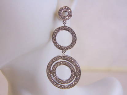 Womens Vintage Sterling Silver Earrings w/ CZ Stones: A PAIR OF WOMENS STERLING SILVER DANGLE EARRINGS WITH CZ STONES THAT WEIGH 7.3g AND MEASURES 2" LONG BY 7/8" WIDE. ANY OTHER QUESTIONS, PLEASE DO NOT HESITATE TO ASK. BE SURE TO CHECK OUT SOME OF