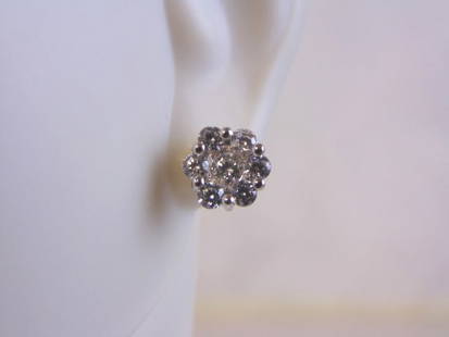 Womens Sterling Silver Earrings w/ Flower CZ Stones: A PAIR OF WOMENS STERLING SILVER EARRINGS WITH FLOWER CZ STONES THAT WEIGH 1.9g AND MEASURES 3/8" IN DIAMETER. ANY OTHER QUESTIONS, PLEASE DO NOT HESITATE TO ASK. BE SURE TO CHECK OUT SOME OF MY