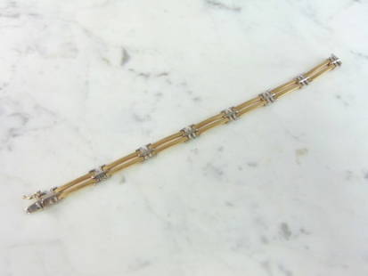 Mens or Womens Vintage Estate 14K Gold Bracelet: FOR SALE IS A LOVELY VINTAGE ESTATE 14K YELLOW & WHITE GOLD BRACELET, THAT WEIGHS 20.6g. THE BRACELET MEASURES 8 1/4" LONG BY 3/8" WIDE. MAKES A GREAT GIFT FOR THAT SPECIAL SOMEONE. IF ANY OTHER