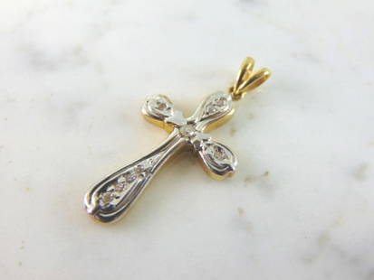 Vintage Estate 14K Gold Diamond Cross Pendant: FOR SALE IS THIS VINTAGE ESTATE 14K YELLOW & WHITE GOLD & DIAMOND RELIGIOUS CROSS PENDANT. THE PENDANT WEIGHS 3.7g AND MEASURES 1 1/4" LONG BY 5/8" WIDE. THERE ARE ABOUT .26cts OF DIAMONDS. PENDANT IS