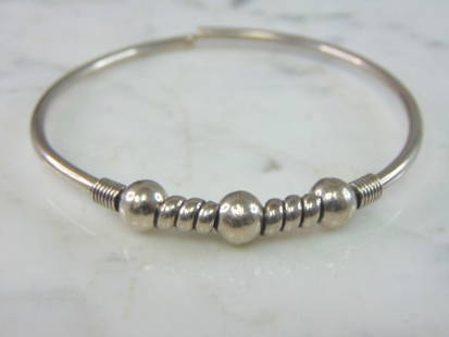 Womens Vintage Estate Sterling Silver Cuff Bracelet: FOR SALE IS A LOVELY VINTAGE ESTATE .925 STERLING SILVER CUFF BRACELET. BRACELET OPENING MEASURES 8 1/4" BY 3/8" WIDE AND WEIGHS 12.3g. THIS WOULD MAKE A LOVELY GIFT FOR THAT SOMEONE SPECIAL. ANY QUES