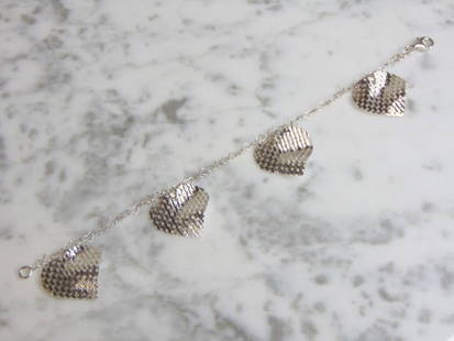 Womens Vintage Sterling Silver Heart Charm Bracelet: FOR SALE IS A LOVELY VINTAGE ESTATE .925 STERLING SILVER HEART BRACELET THAT MEASURES 7 1/4" LONG AND WEIGHS 7.2g. HEART CHARMS MEASURE 7/8" BY 7/8". THIS WOULD MAKE A LOVELY GIFT FOR THAT SOMEONE SPE
