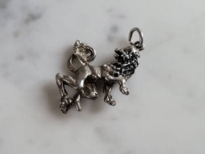 Womens Vintage Estate Sterling Silver Standing Lion Charm: A WOMENS VINTAGE ESTATE STERLING SILVER STANDING LION CHARM. THE CHARM MEASURES 1" LONG BY 3/4" WIDE AND WEIGHS 4.5g. ANY QUESTIONS, PLEASE ASK. BE SURE TO CHECK OUT SOME OF MY OTHER GREAT ITEMS