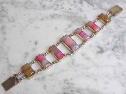 Womens Vintage Estate Sterling Silver Agate Bracelet: FOR SALE IS A LOVELY VINTAGE ESTATE .925 STERLING SILVER AGATE BRACELET. NOT SURE IF STONES ARE REAL OR MAN MADE. BRACELET MEASURES 8 3/8" LONG BY 1 1/8" WIDE AND WEIGHS 49.2g. THIS WOULD MAKE A LOVEL