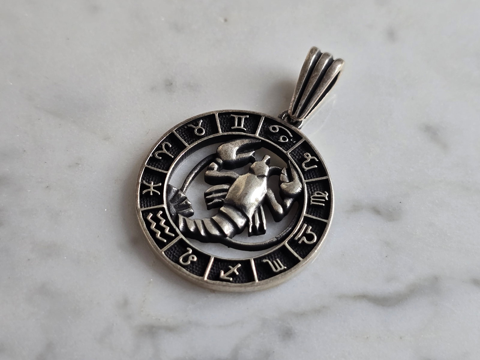 Womens Estate Sterling Silver Zodiac Scorpio Pendant: AN ESTATE STERLING SILVER ZODIAC SCORPIO PENDANT. THE PENDANT WEIGHS 7.3g AND MEASURES 1 3/8" LONG BY 1" WIDE. MAKES A GREAT GIFT FOR THAT SOMEONE SPECIAL. ANY QUESTIONS, PLEASE ASK. BE SURE TO CHECK 