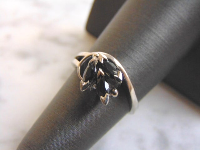 Womens Sterling Silver Ring w/ Sapphire Colored Stones: A WOMENS STERLING SILVER RING WITH A SAPPHIRE COLORED STONES. NOT SURE IF THE STONE IS NATURAL OR MAN MADE. THE RING WEIGHS 2.8g. THE SIZE OF THE RING IS A 6.0. ANY QUESTIONS PLEASE DO NOT HESITATE TO