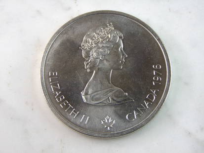 1976 $10 Canadian Montreal Olympics Silver Coin: FOR SALE IS THIS 1976 $10 CANADIAN MONTREAL OLYMPICS SILVER COIN. COIN APPEARS TO BE IN VERY GOOD CONDITION, HOWEVER WE ARE NOT COIN EXPERTS WHEN IT COMES TO PROPER GRADING. PICTURES SHOULD BE