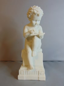VICTORIAN STATUE OF BOY WRITING W/ MARBLE FINISH