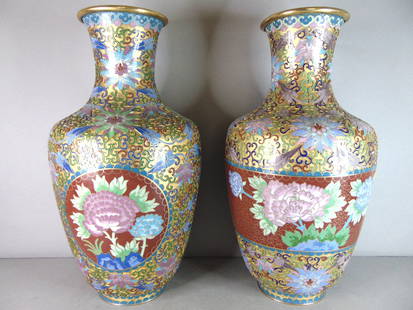 Pair of Decorative Vintage Estate Chinese Asian Cloisonne Floral Vases: A PAIR OF DECORATIVE VINTAGE ESTATE CHINESE CLOISONNE VASES. THE VASES MEASURE 15 1/4" TALL BY 7 3/4 AT ITS WIDEST POINT. BOTH VASES HAVE SOME MINOR DINGS AS SEEN IN THE PICTURES, WOULD BE BUYING AS I