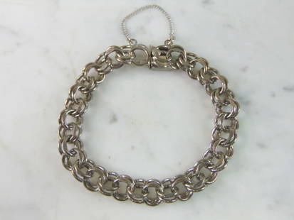 Womens Vintage Estate Sterling Silver Bracelet: A WOMENS VINTAGE ESTATE STERLING SILVER BRACELET. BRACELET IS 8 1/8" LONG BY 3/8" WIDE, AND WEIGHS 25.9g. THIS WOULD MAKE A LOVELY GIFT FOR THAT SOMEONE SPECIAL. BE SURE TO CHECK OUT SOME OF MY OTHER