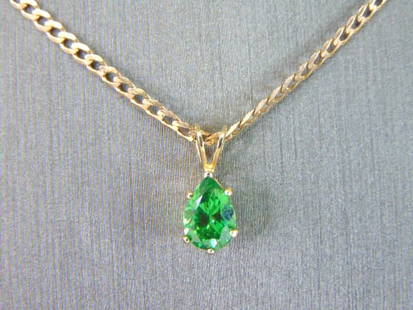 Womens Vintage Estate 14K Yellow Gold Pendant & Necklace: A WOMENS VINTAGE ESTATE 14K YELLOW GOLD PENDANT WITH NECKLACE. NOT SURE WHAT THE STONE IS OR IT IT IS NATURAL OR MAN MADE. BOTH PIECES ARE STAMPED 14K. THE NECKLACE AND PENDANT WEIGHS 3.4g. THE NECKLA