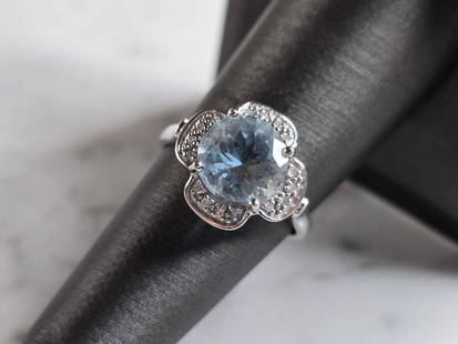 Womens Vintage Estate 14K White Gold Aqua Diamond Ring: A WOMENS VINTAGE ESTATE 14K WHITE GOLD AQUA RING ACCENTED WITH DIAMONDS. THE RING WEIGHS 3.7g, AND IS A SIZE 7.0. THE WIDTH OF THE RING IS 1/2". STONE TESTED AS AQUA, HOWEVER NOT SURE IF AQUA