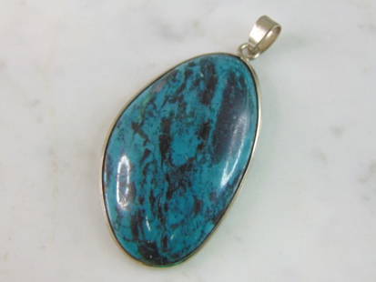 Womens Vintage Sterling Silver Chrysocolla Pendant: FOR SALE IS THIS LOVELY VINTAGE STERLING SILVER CHRYSOCOLLA COLORED PENDANT. NOT SURE IF STONE IS NATURAL OR MAN MADE. THE PENDANT WEIGHS 12g. THE PENDANT MEASURES 2 1/4" WIDE BY 2 1/8" LONG. 